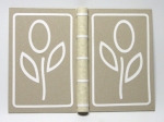 Photo showing cutouts glued to bookboards